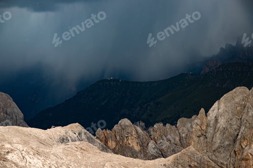 Preview: The view of Sassolungo and the Sella Group from Serauta in stormy weather in the Dolomites, Italy.