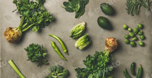 Preview: Healthy vegan salad ingredients layout over concrete background, wide composition