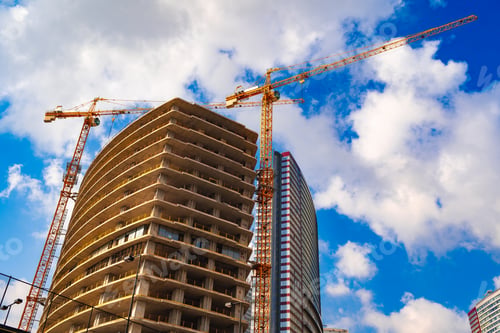 Preview: Building construction site against blue sky in Istanbul.