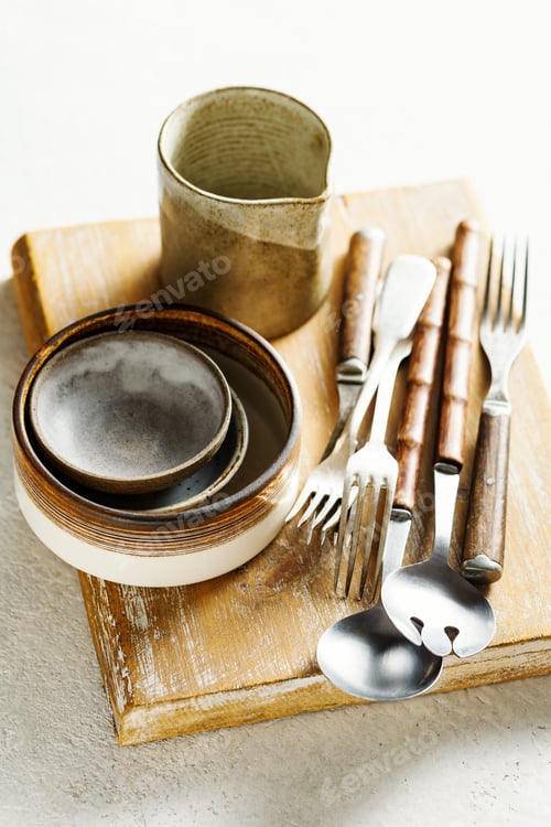 Preview: Modern ceramic tableware and old utensils