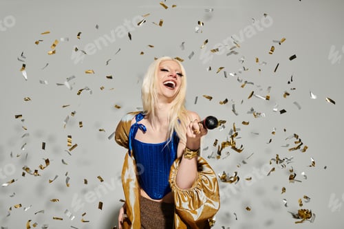 Preview: Stylish young drag queen celebrates with confetti in a chic and vibrant setting