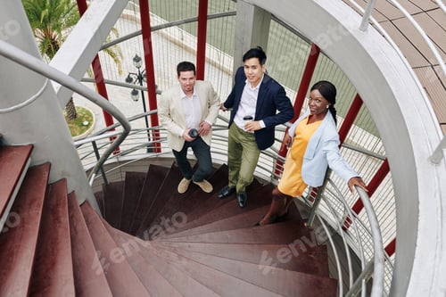 Preview: Business team on spiral staircase