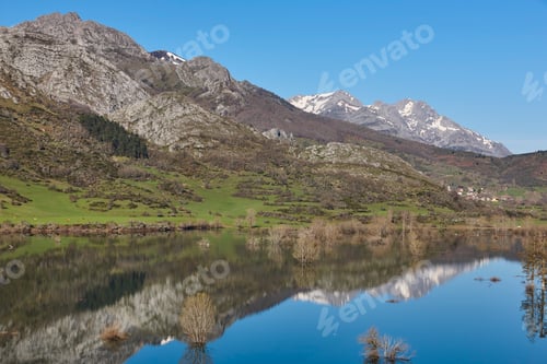Preview: Picturesque reservoir and mountain landscape in Riano. Mirror effect. Spain