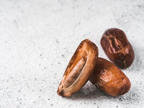 Preview: Dried dates on gray cement,copyspace