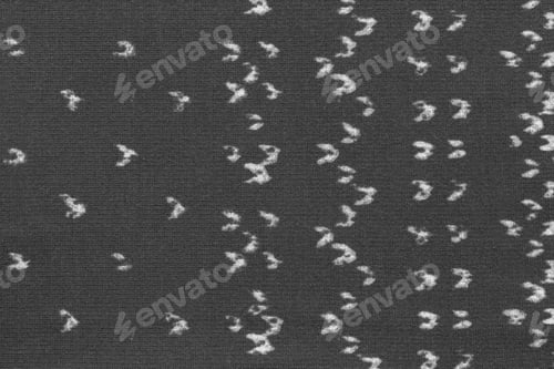 Preview: Monochrome Knitted Fabric With A Spotty Abstract Pattern For Textural Backgrounds And For Wallpaper