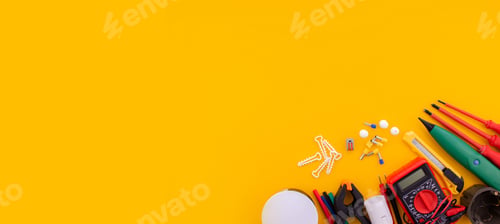 Preview: Electrical installation measuring instruments tools on a yellow background with copy space