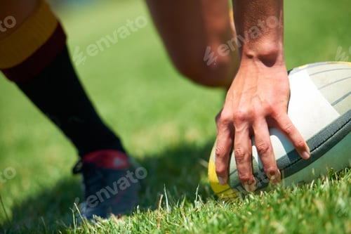 Preview: We came to win. Closeup shot of a mans hand on a rugby ball.