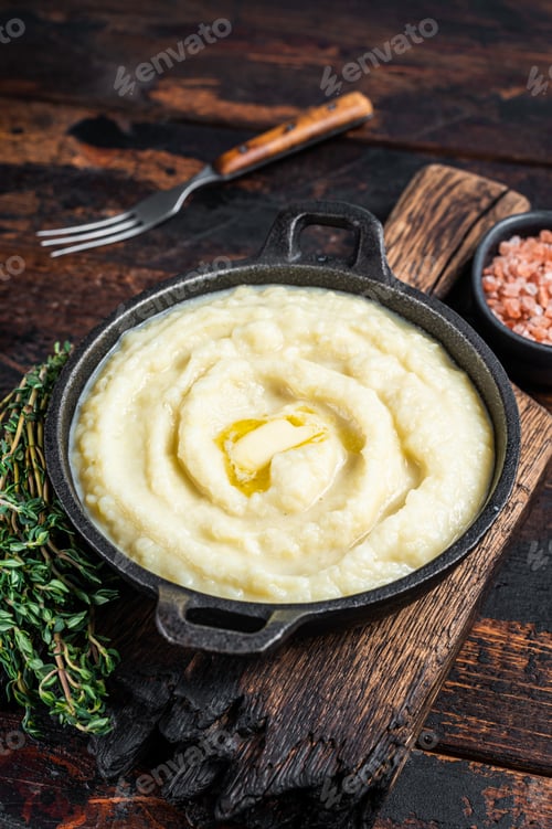 Preview: Mashed potatoes in a pan on wooden rustic table. Wooden background. Top view