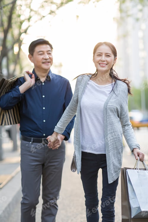 Preview: Happy mature couple shopping