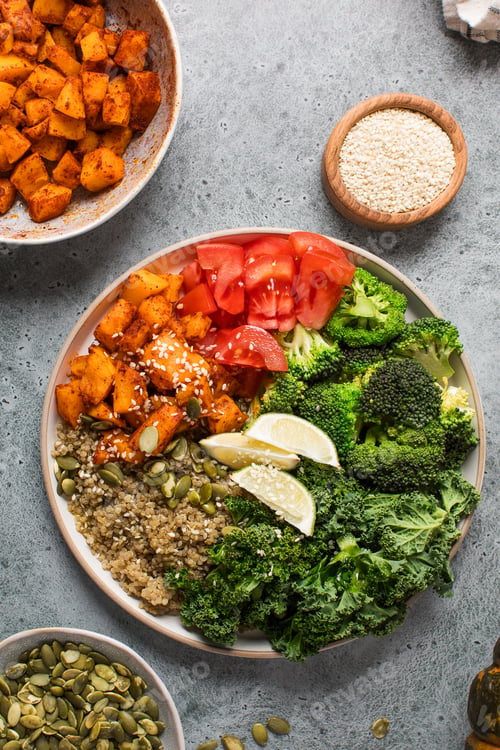 Preview: Healthy vegan Buddha bowl with quinoa, pumpkin and seasonal vegetables. Vegetable recipes.