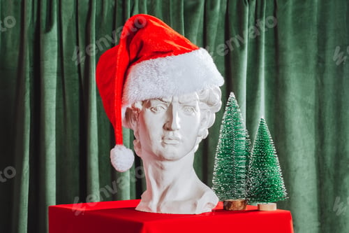 Preview: Creative still life with David's head and Christmas decorations