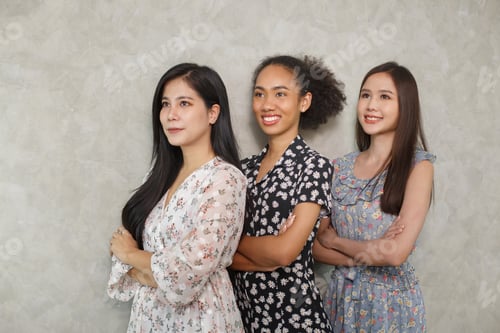 Preview: International Women's Day. Group of three diverse young women having smiling. generation Z, gen z,