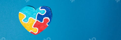 Preview: Banner. Colorful puzzle heart on a blue background