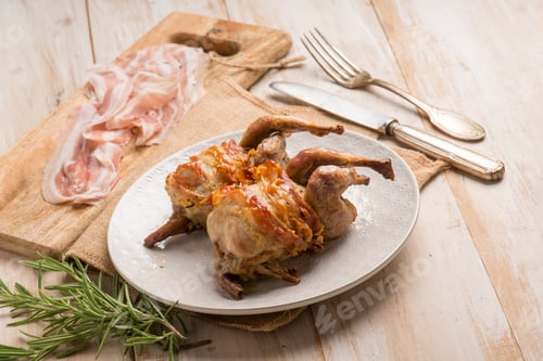 Preview: baked quail bacon wrapped and rosemary