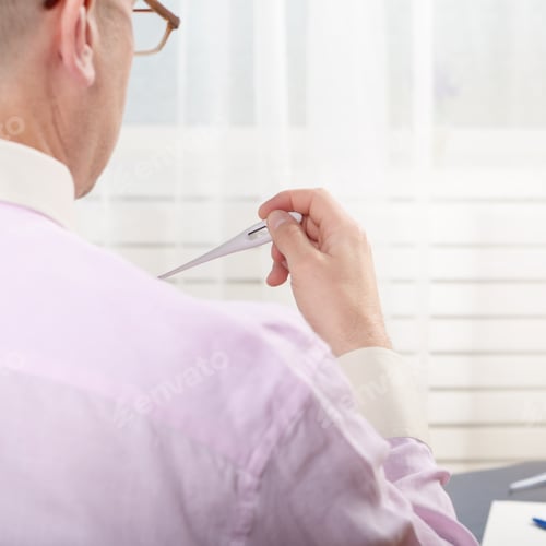 Preview: Man read measurement result from digital thermometer