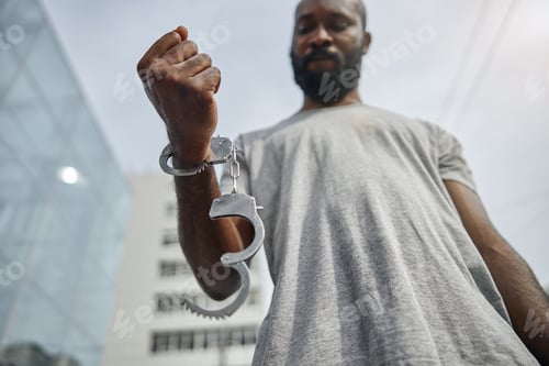 Preview: Attentive bearded man looking at his arm