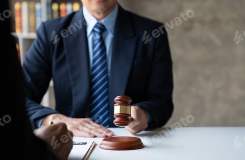 Preview: Legal concept. Young asian lawyer or legal advisor discussing contracts and business agreements in l