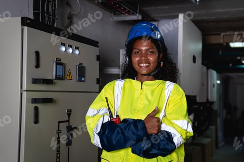 Preview: Technician Engineering setting inverter solar panel in electrical room.