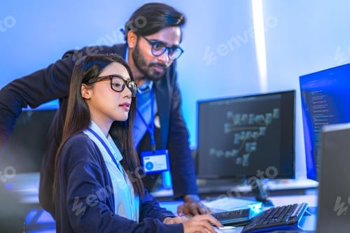 Preview: Diverse team of AI developers collaborating in a modern office.