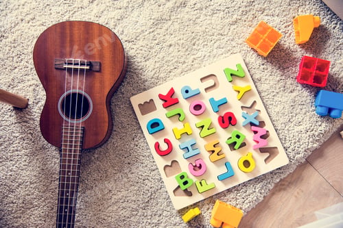 Preview: Guitar and educational toys in living room