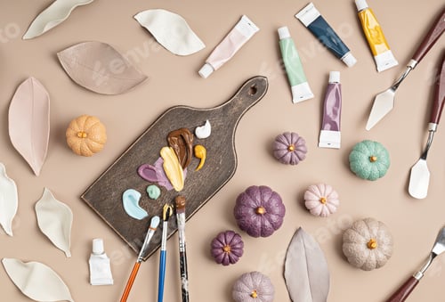 Preview: Hobby background with handmade clay leaves, paint brushes and art accessories