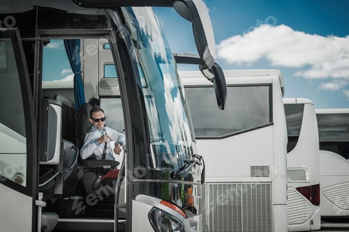 Preview: Bus Driver Pointing At Wrist Watch.