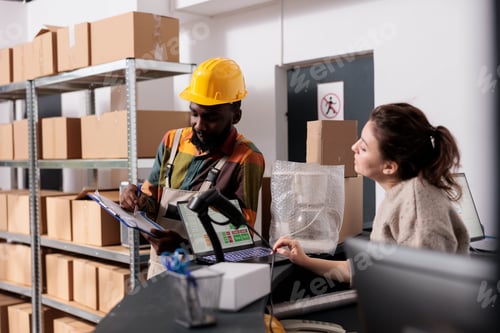 Preview: African american coworker analyzing goods checklist