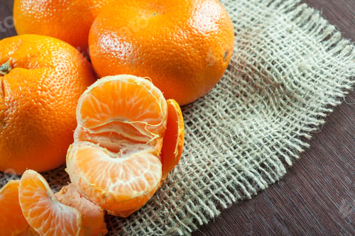 Preview: fresh mandarines on wooden table