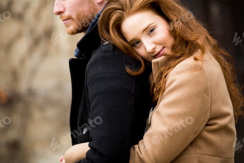 Preview: Young red hair couple at autumn park