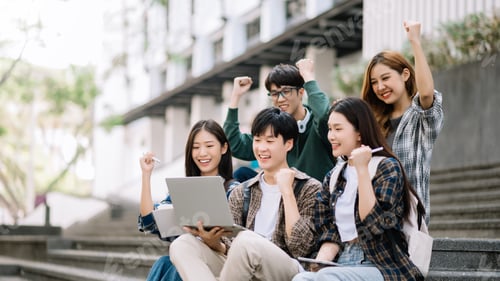 Preview: Asian Students are studying the campus park.Young people are spending time together.