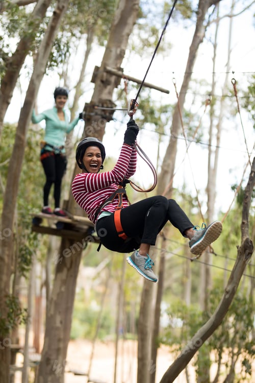 Preview: Woman on zipline in adventure park