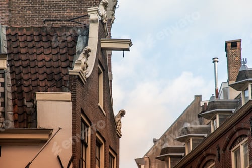 Preview: Low angle shot of a neighborhood with apartment buildings in Amsterdam