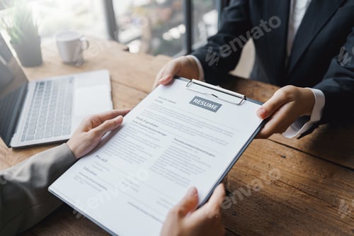Preview: New graduate women fill out the human resources department application form review and prepare your