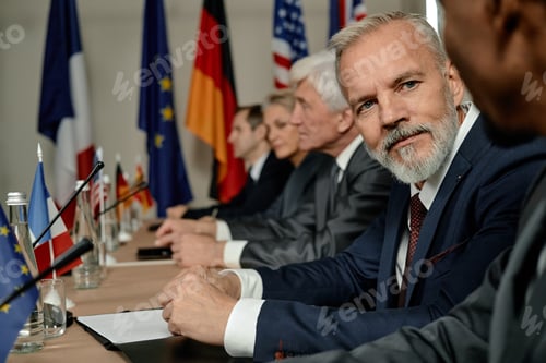 Preview: Caucasian Middle Aged Man Attending International Political Conference Meeting