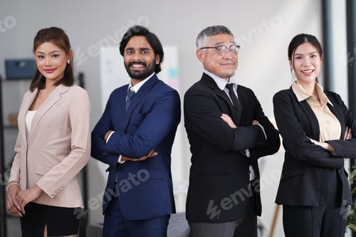 Preview: Group of executive staff standing diligently and politely