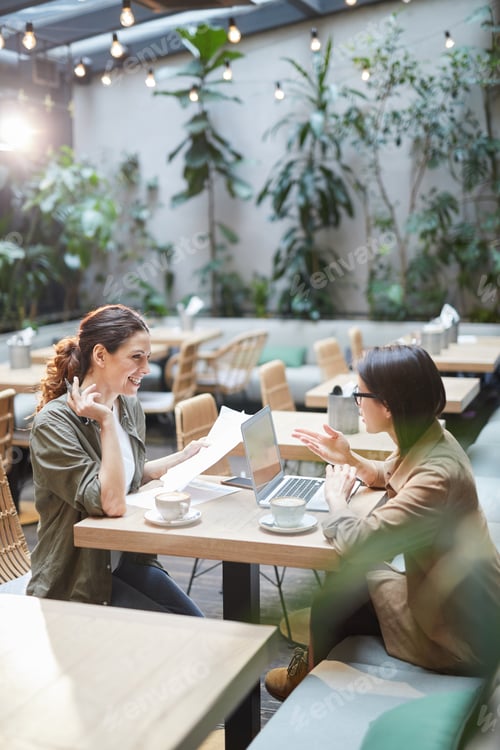 Preview: Two Modern Young Women in Cafe