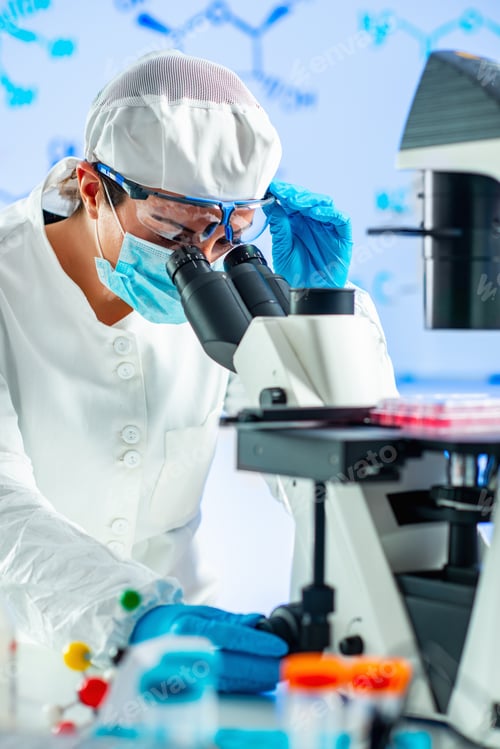 Preview: Biotechnology engineer inspecting cell culture flask