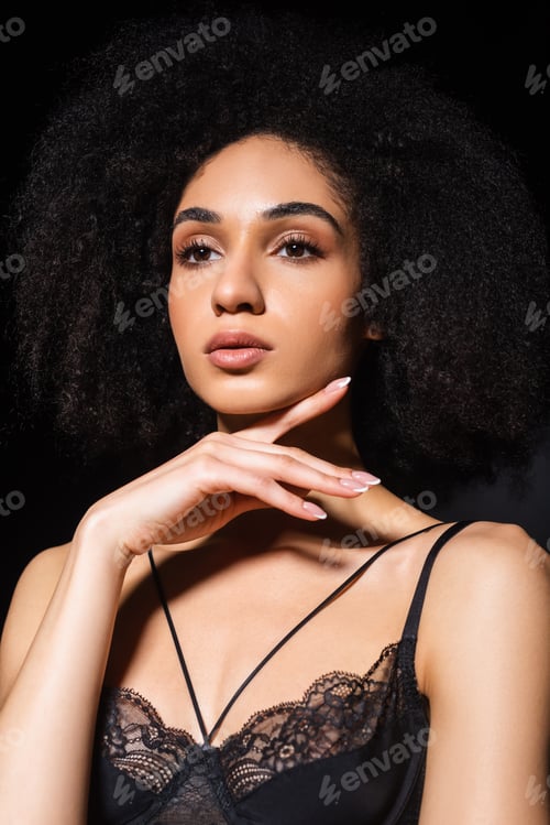 Preview: Pretty african american woman in lingerie isolated on black