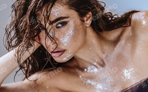 Preview: Portrait of young hot woman posing in studio