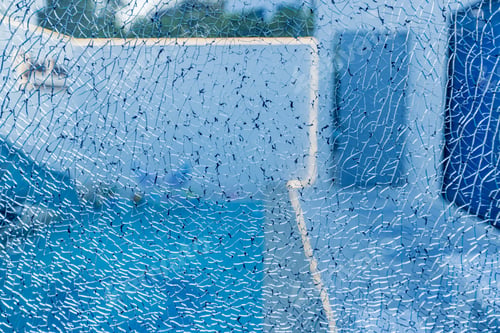Preview: Broken glass with cracks. Abstract of cracked windows.