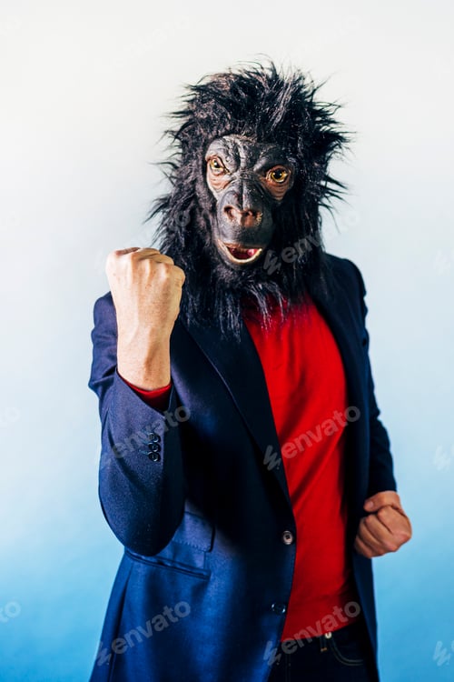 Preview: Man in a suit and with a gorilla mask.
