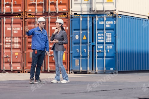 Preview: Container manufacturing manager and businesswomen survey the area to plan the storage