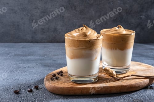 Preview: Dalgona coffee, Iced fluffy creamy whipped trend drink with coffee foam and milk.