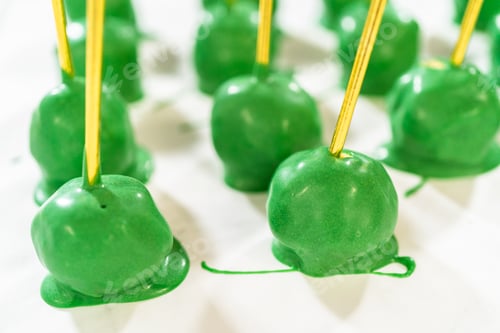 Preview: Green Candy Apples With Gold Sticks on White