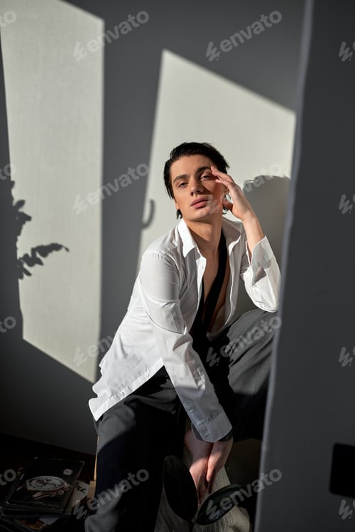 Preview: romantic sensual guy looking at camera