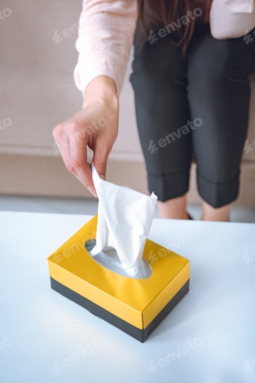 Preview: cropped shot of woman taking paper napkins from box