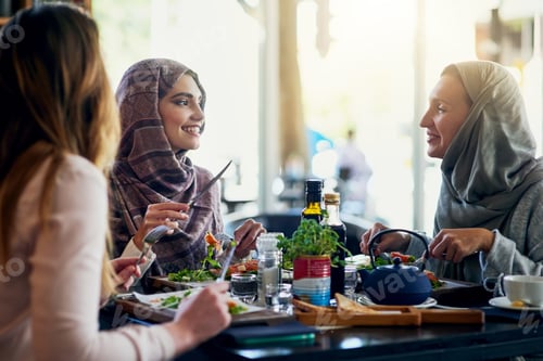 Preview: Shot of a group of women getting together for lunch in a cafe