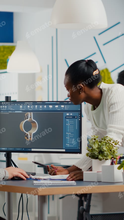 Preview: Professional heavy industry team of engineers working on computer