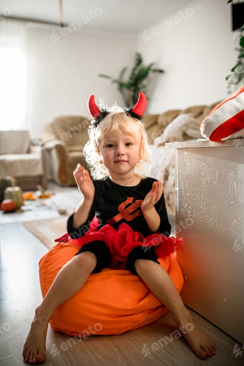 Preview: Girl enjoys Halloween at home in costume