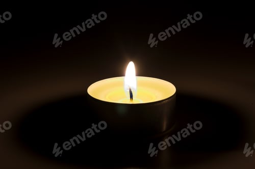 Preview: Burning candle in the dark